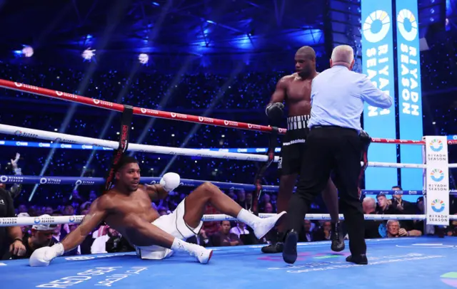 Anthony Joshua on the ropes on the canvas