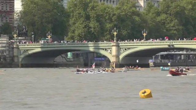 Some of the boats pass under Westminster Bridge