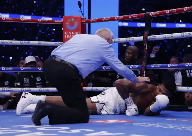 Anthony Joshua on the canvas