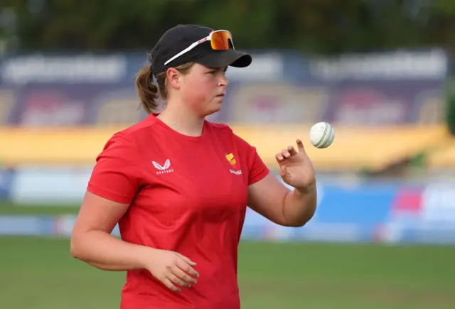 Grace Scrivens warms up before the final