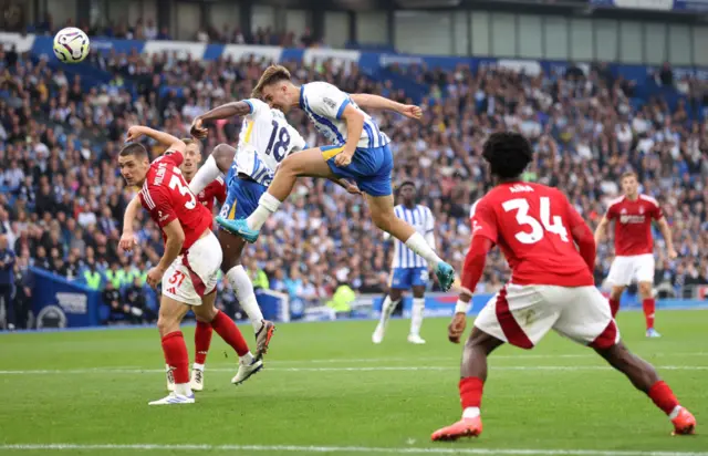 Hinshelwood connects with the ball