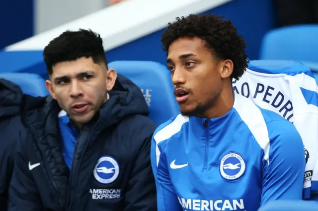 Joao Pedro sits on the bench