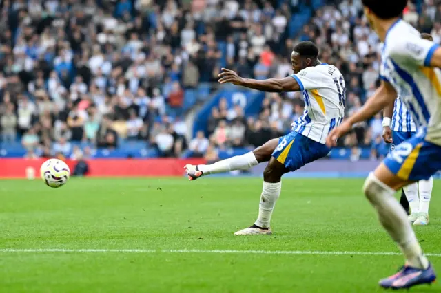 Welbeck takes his free kick