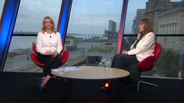 kuenssberg and rayner sitting down on set