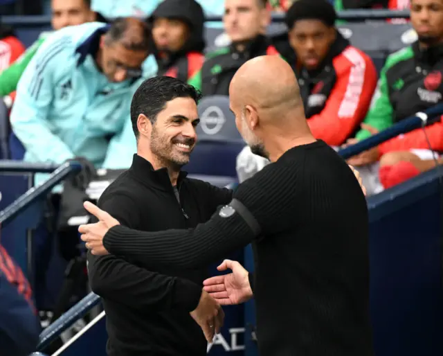 Arteta and Guardiola greet