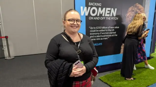 Woman in a tartan skirt