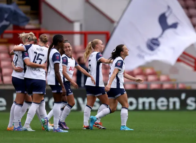 Spurs players celebrate Raso's goal