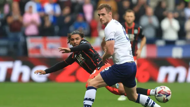 Blackburn's Tyrhys Dolan and Preston's Liam Lindsay battle for the ball