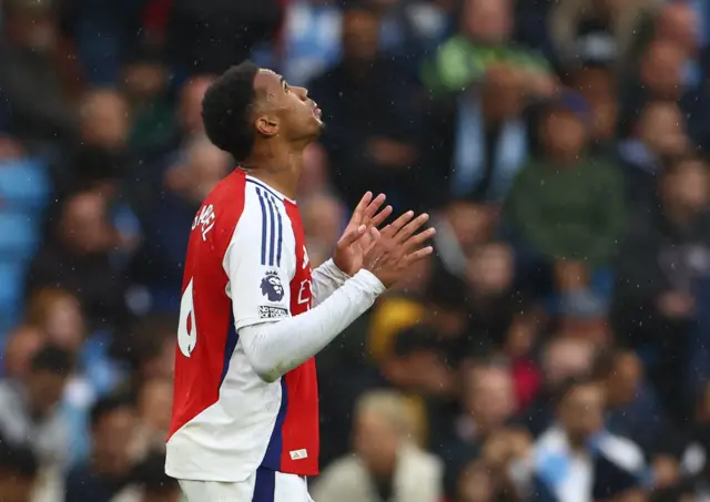 Gabriel looks to the sky as he celebrates