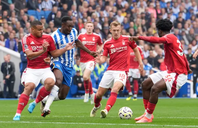 Welbeck grapples for the ball