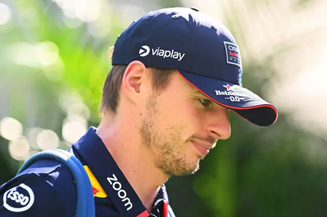 Max Verstappen arrives in the Singapore paddock