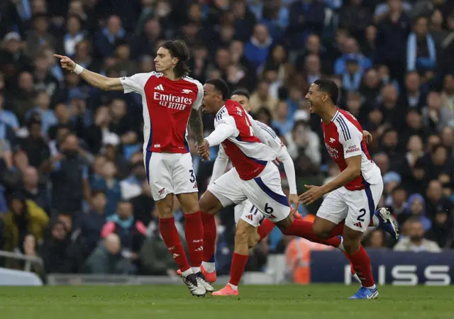 Arsenal players celebrate