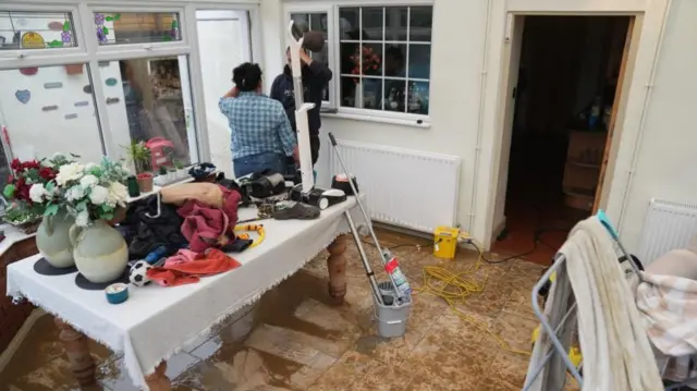 Home being cleared up after floods in Grendon