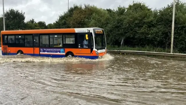 A stranded bus at junction nine of the M1 near Harpenden