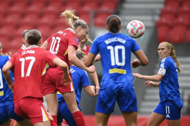 Sophie Roman Haug heading the ball