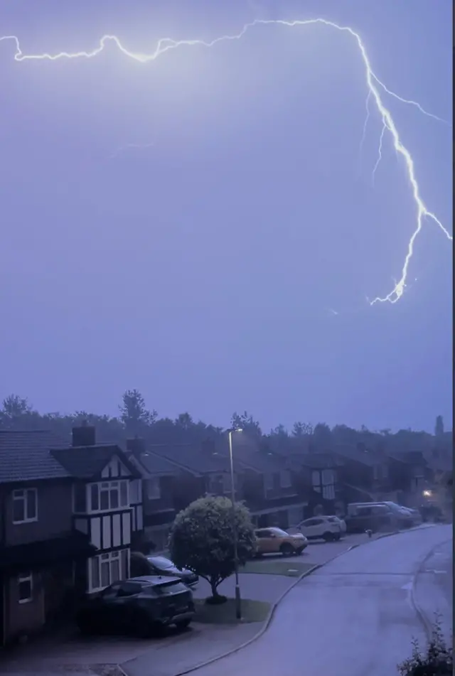 Lightning over houses in Great Oakley, Corby, Northamptonshire.