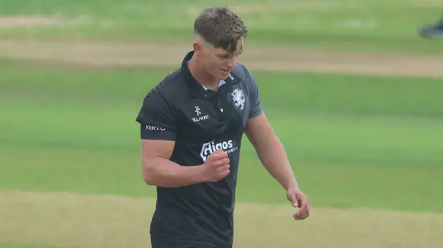 George Thomas of Somerset celebrates getting Colin Ingram of Glamorgan out