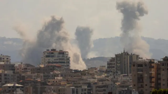 Smoke seen above buildings in southern Lebanon following Israeli air strikes