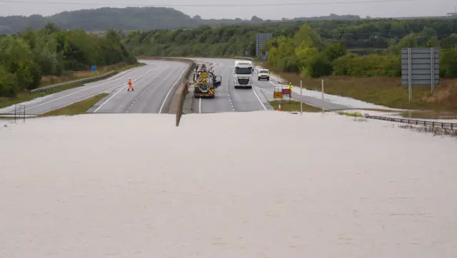 Flood water on the A421 in Marston Moretaine, Bedfordshire