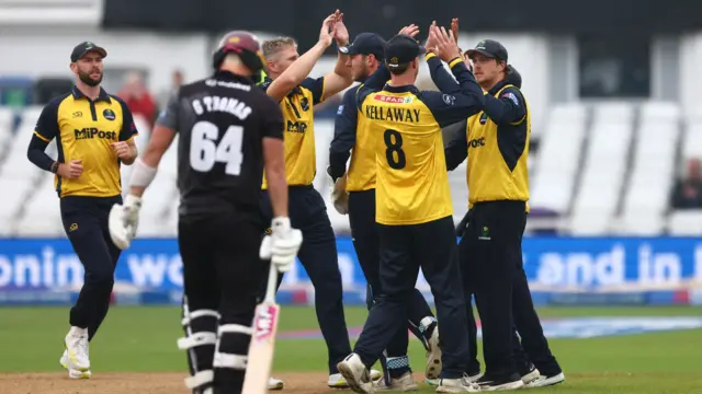 Glamorgan celebrate wicket of George Thomas