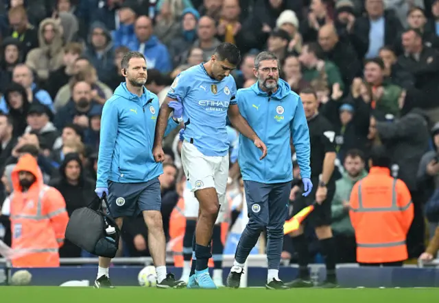 Rodri walks off the pitch