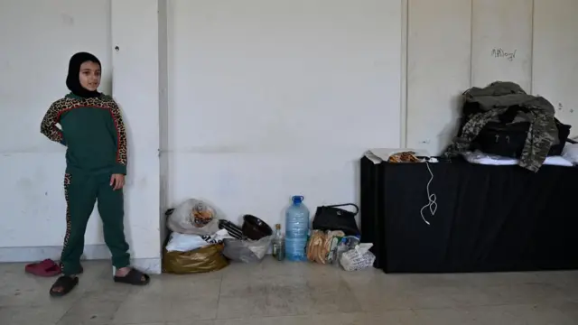 Girl in school shelter