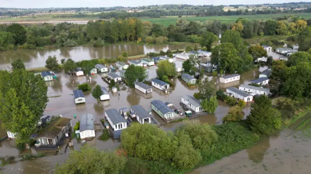 An aerial shot of Cogenhoe Mill Holiday Park shows the ground at the site is completely under water.