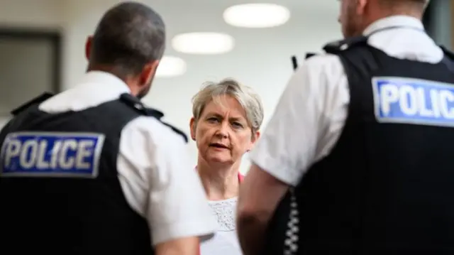 Yvette Cooper speaking to police in Liverpool on Saturday