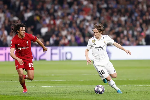 Luka Modric of Real Madrid and Trent Alexander-Arnold