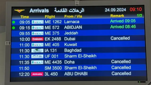 An information board shows some cancelled flights, at the Beirut-Rafic Hariri International Airport