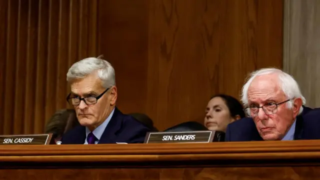 Senator Bill Cassidy (L) and Senator Bernie Sanders (R)