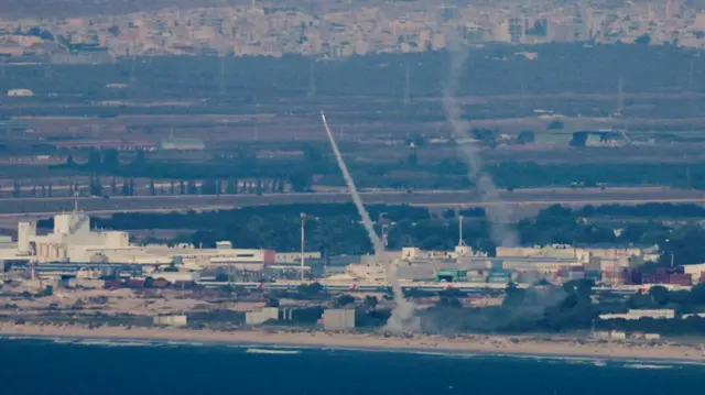 Israel's Iron Dome anti-missile system operates for interceptions as rockets are launched from Lebanon towards Israel, amid cross-border hostilities between Hezbollah and Israel, as seen from Haifa