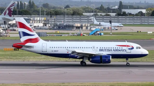 A British Airways plane sits on the tarmac in London