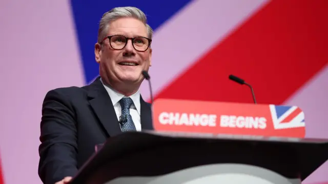 Starmer speaks at a lectern