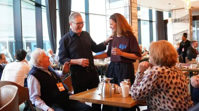 Keir Starmer and his wife Victoria meeting guests at their Liverpool hotel this morning