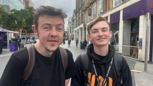 Steven and Brody, pictured outside on a busy street in Liverpool