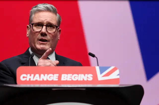 Starmer speaks at a lectern