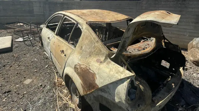 A burnt out car