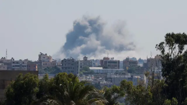 Smoke rises above a skyline in southern Lebanon