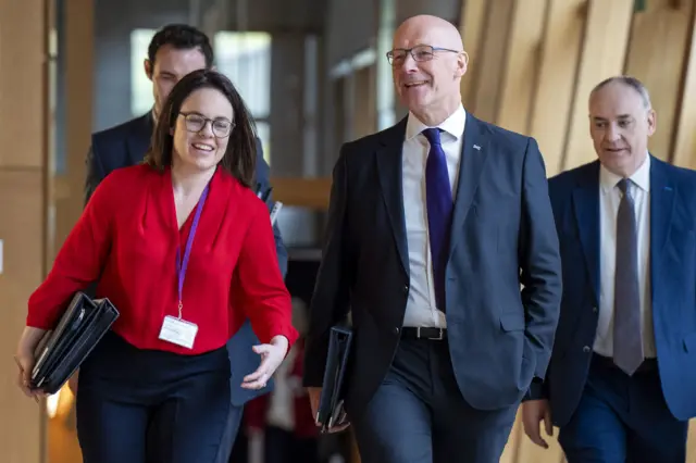 First Minister John Swinney and Deputy First Minister Kate Forbes arrives for First Minister's Questions at the Scottish Parliament in Holyroo