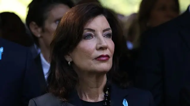 New York Governor Kathy Hochul, wearing a navy suit, looks off to the right (file photo)