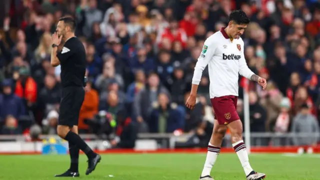 Edson Alvarez of West Ham United reacts after being sent off during the Carabao Cup Third Round match between Liverpool and West Ham United at Anfield on September 25, 2024 in Liverpool, England.