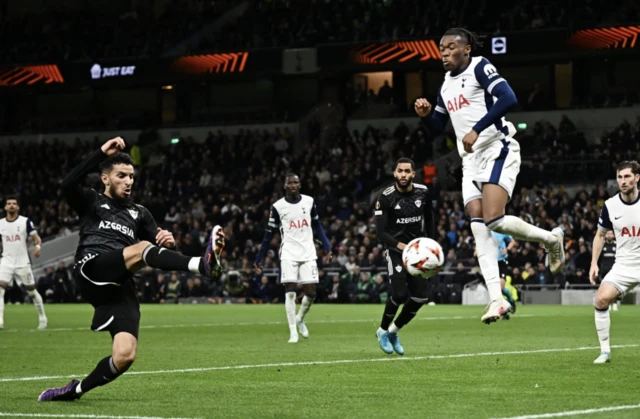 Qarabag's Abdellah Zoubir shoots at goal