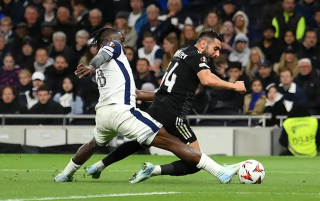 Elvin Jafarguliyev of Qarabag FK fouled by Yves Bissouma