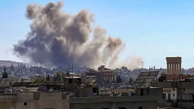 This picture shows smoke rising on Wednesday above the ancient city of Baalbek, after an Israeli strike