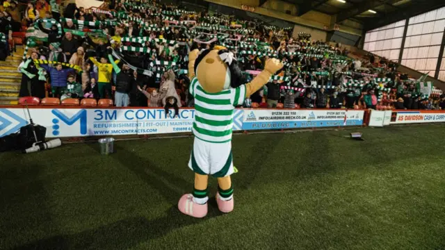 Celtic fans and mascot