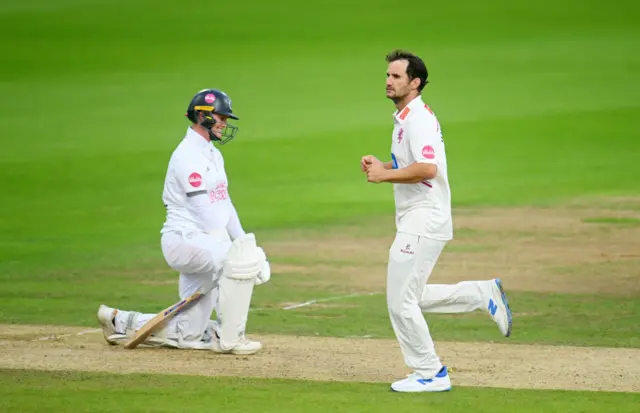 Lewis Gregory celebrates taking wicket