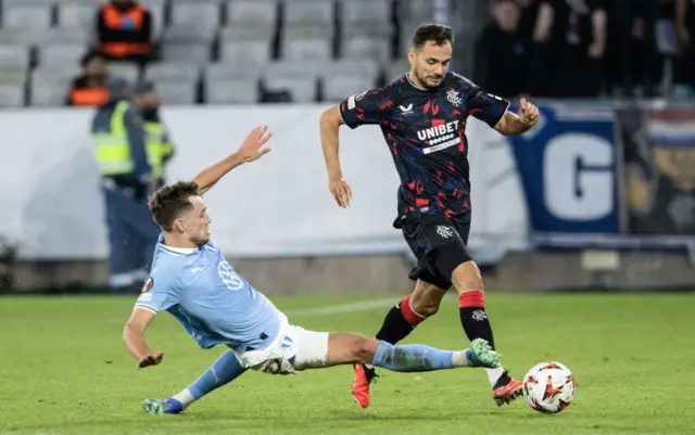 MALMO, SWEDEN - SEPTEMBER 26: Rangers' Nedim Bajrami (R) and Malmo's Colin Rosler in action during a UEFA Europa League Matchday One League Phase match between Malmo FF and Rangers at the Eleda Stadion, on September 26, 2024, in Malmo, Sweden. (Photo by Alan Harvey / SNS Group)