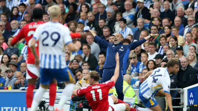 Nuno Espirito Santo, Manager of Nottingham Forest, reacts after Chris Wood of Nottingham Forest is challenged by Joel Veltman of Brighton & Hove Albion during the Premier League match between Brighton & Hove Albion FC and Nottingham Forest FC at Amex Stadium on September 22, 2024 in Brighton, England.