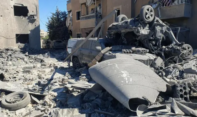 Damaged vehicles after Israeli strikes on Saksakiyeh, southern Lebanon